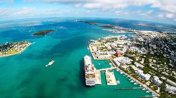 Aerial view of a port with greenish-blue water and boats Aerial view of a port with greenish-blue water and boats