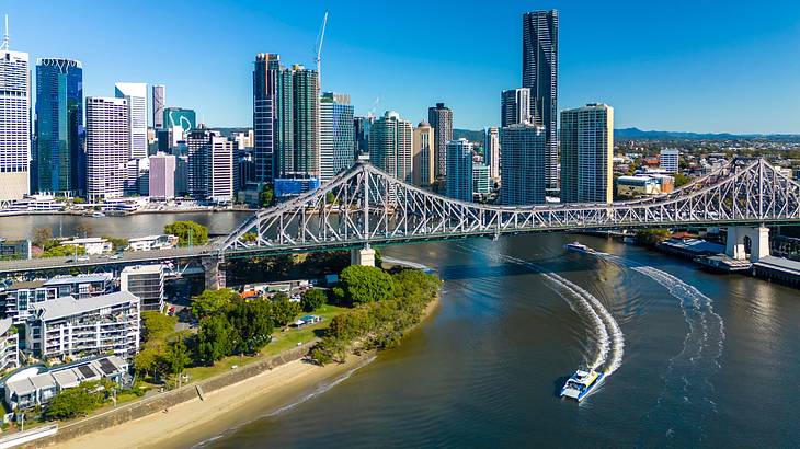 Best Brisbane Lookouts - Panorama of a blue sky with buildings and a bridge