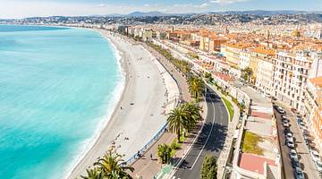 A weekend in Nice, France - View of mediterranean city & beach coastline from above A weekend in Nice, France - View of mediterranean city & beach coastline from above