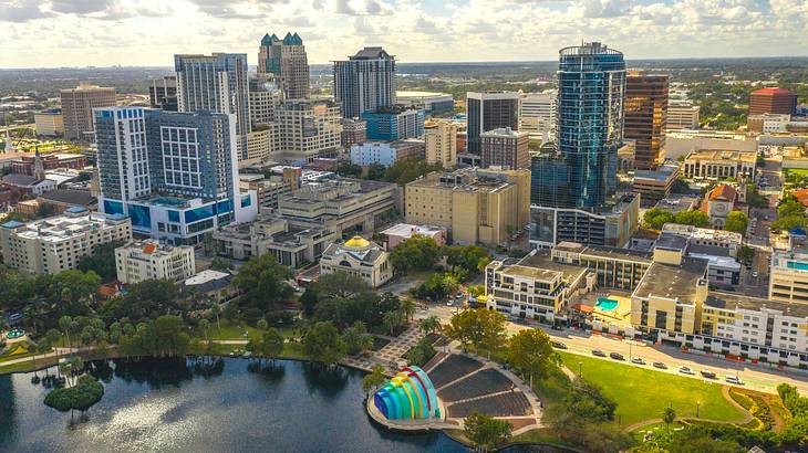 An aerial shot of a city beside a body of water