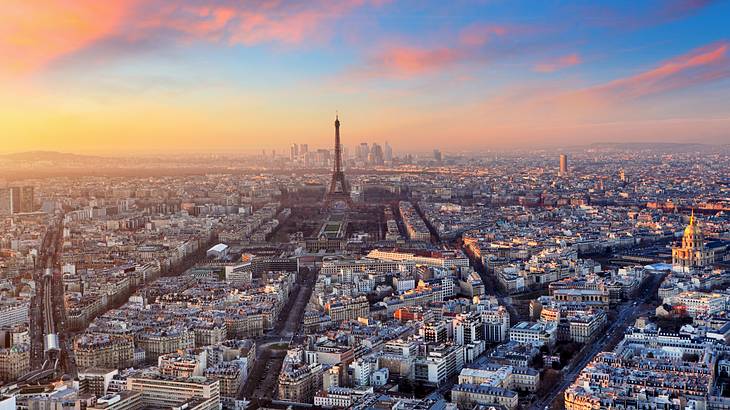 Aerial view of Paris with many famous landmarks in France, like the Eiffel Tower Aerial view of Paris with many famous landmarks in France, like the Eiffel Tower