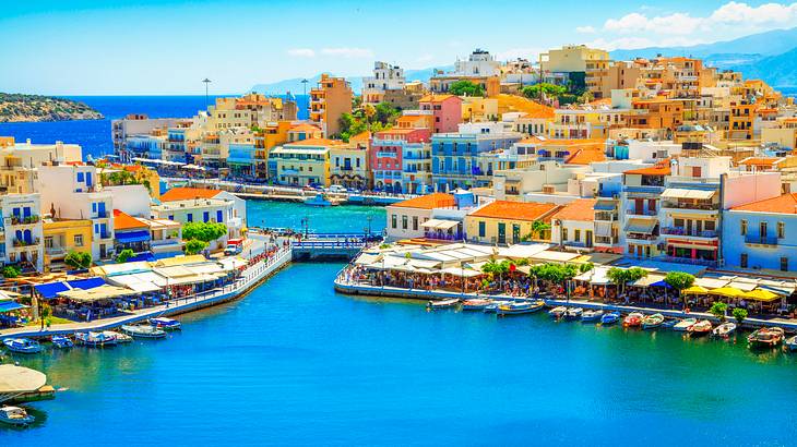 Aerial shot of a coastal village with colorful houses