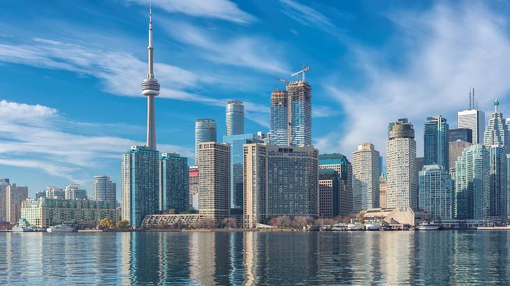 weekend in Toronto itinerary - Downtown Toronto skyline along water, Ontario, Canada