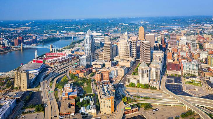 Aerial shot of an urban city with skyscrapers and roads