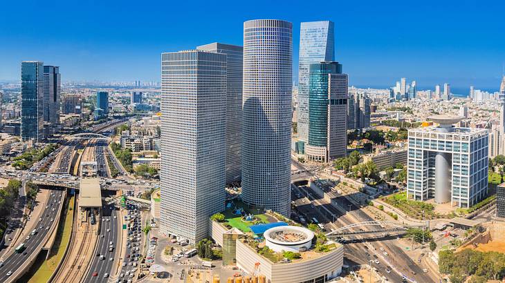 Aerial shot of an urban city with tall modern skyscrapers