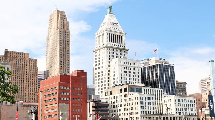 Skyscrapers under a blue sky with clouds