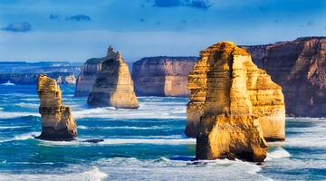 Australian Landmarks - Giant rocks standing in blue water, 12 Apostles, Australia