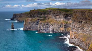 A famous landmark in Ireland, the Cliffs of Moher surrounded by water