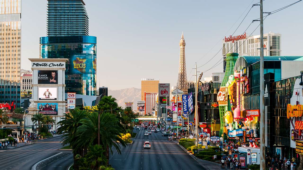Las Vegas Boulevard with Eiffel Tower replica, buildings, and billboards