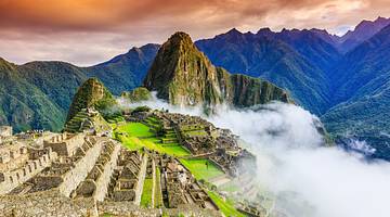 Ancient ruins of Machu Picchu on a mountain top, one of the famous landmarks in Peru