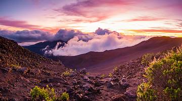 Sunrise at Haleakala volcano summit, one of the famous landmarks in Maui