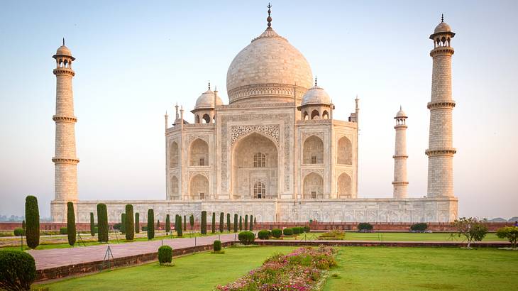 The beautiful white Taj Mahal is one of the most famous landmarks in India