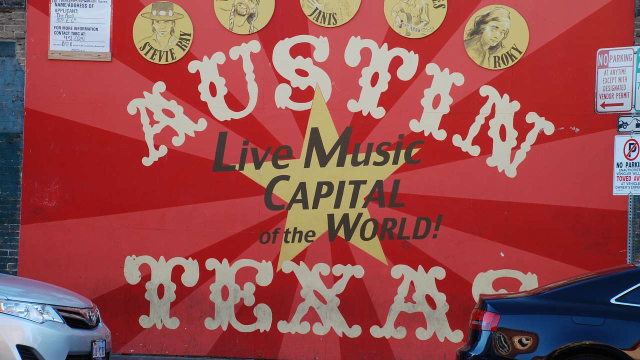 Red sign with "Austin, Live Music Capitol of the World, Texas" written on it