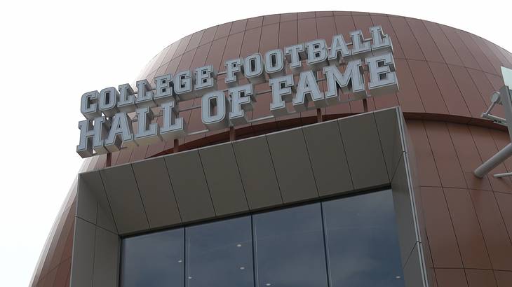 A building with a "College Football Hall of Fame" sign on it