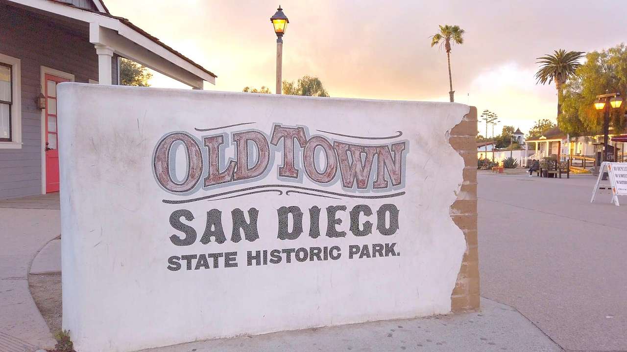 A sign which says "Old Town San Diego State Historic Park"