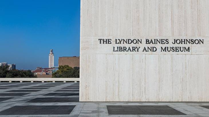A building that says "The Lyndon Baines Johnson Library and Museum" on it