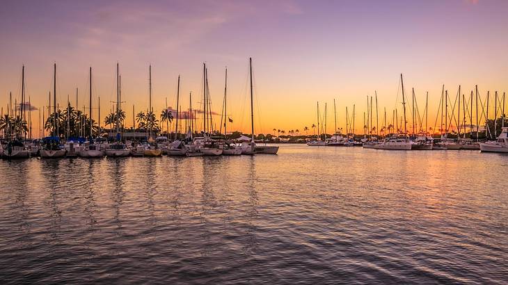 One of many fun things to do in Honolulu at night is setting sail on a sunset cruise