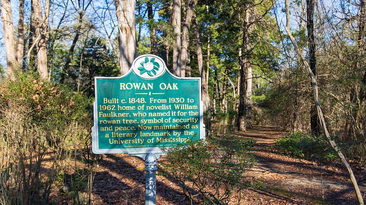 A green sign at Rowan Oak, one of the famous landmarks in Mississippi