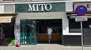 The exterior of an ice cream shop that says "MITO Il Gelato E Italiano"