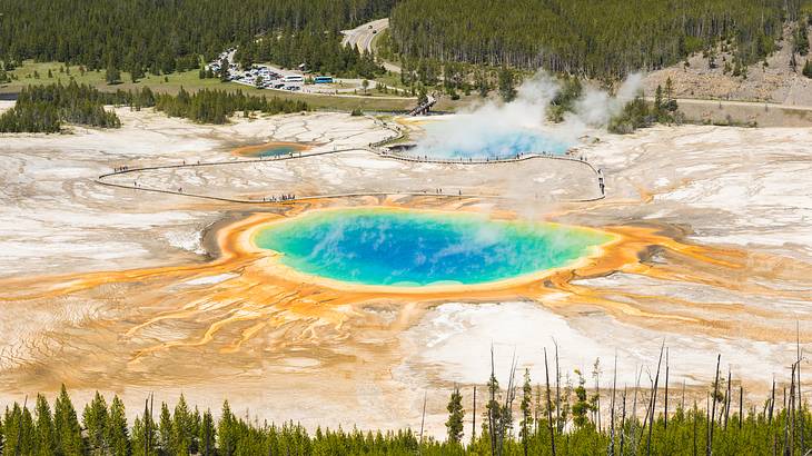 The blue Grand Prismatic Spring in Yellowstone is one of the famous US landmarks