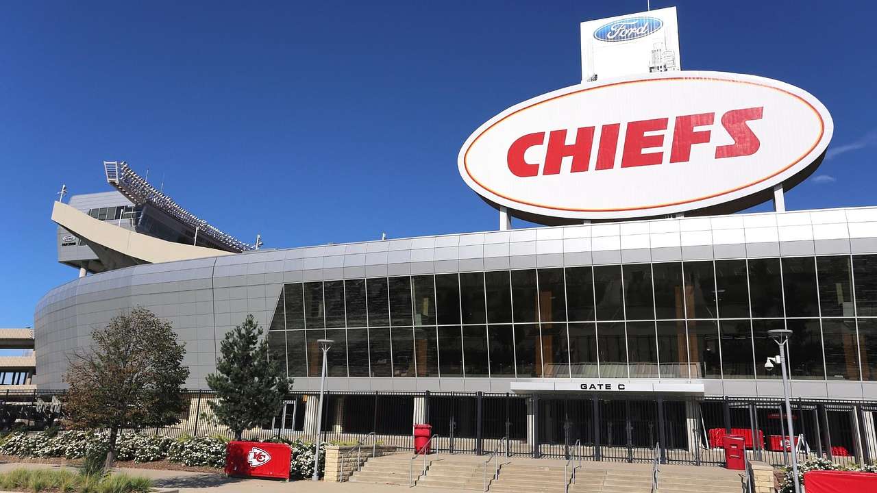 The entrance to a sports stadium with a red sign that says "Chiefs"