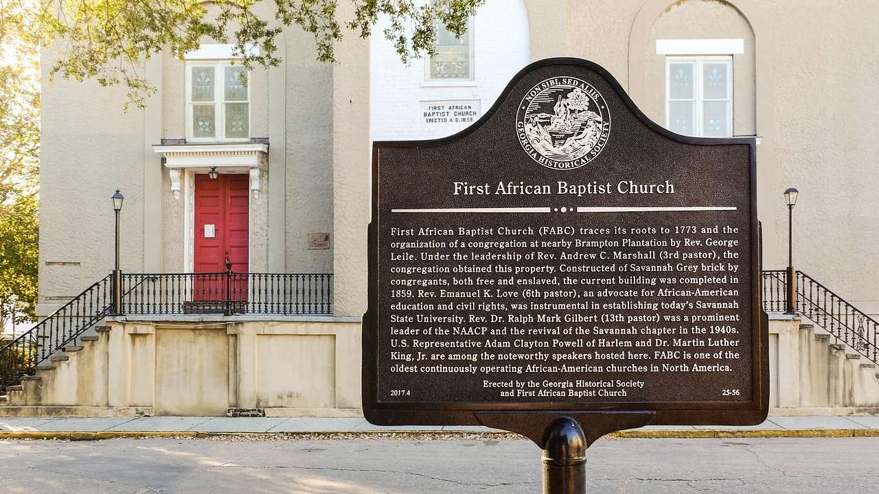 A plaque that says "First African Baptist Church" with more text below it