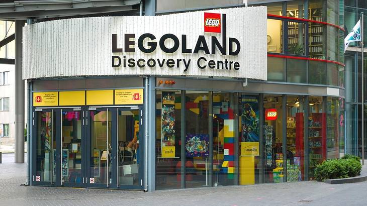 The entrance to a Lego attraction with a "Legoland Discovery Center" sign outside