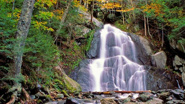 One of the best things to do in Stowe, Vermont, in the fall is seeing Moss Glen Falls