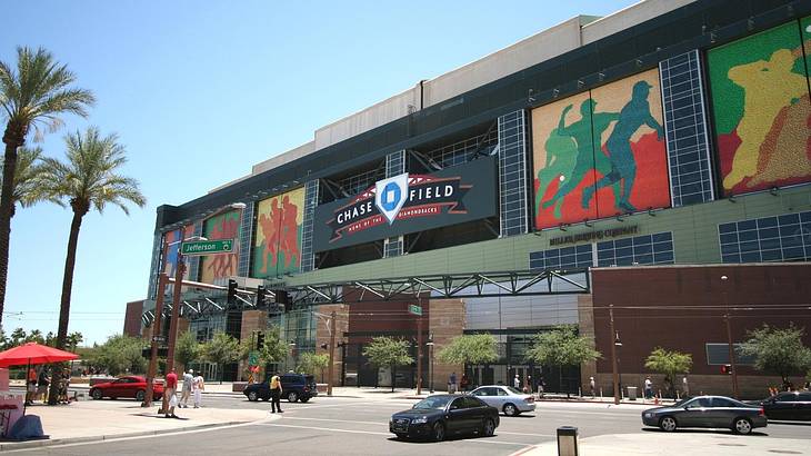A sports stadium with a sign that says "Chase Field"
