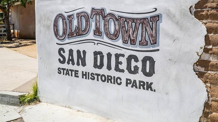A sign that says "Old Town San Diego State Historic Park" A sign that says "Old Town San Diego State Historic Park"