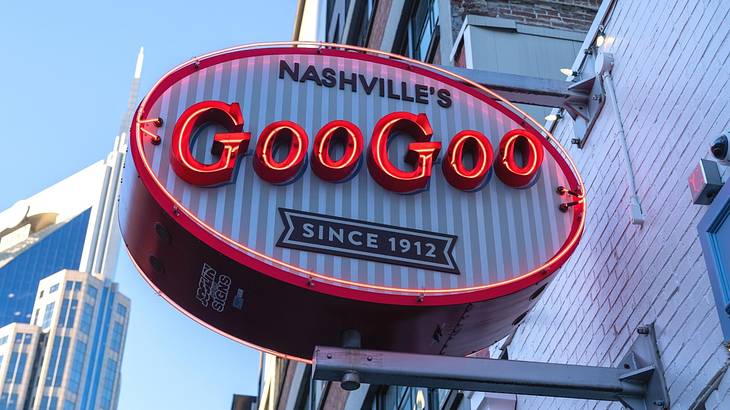 A neon sign on a building that says "Nashville's, Goo Goo, since 1912"