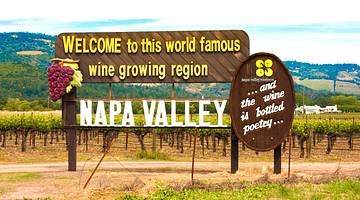 A sign in a vineyard at the start of the Napa Valley wine country