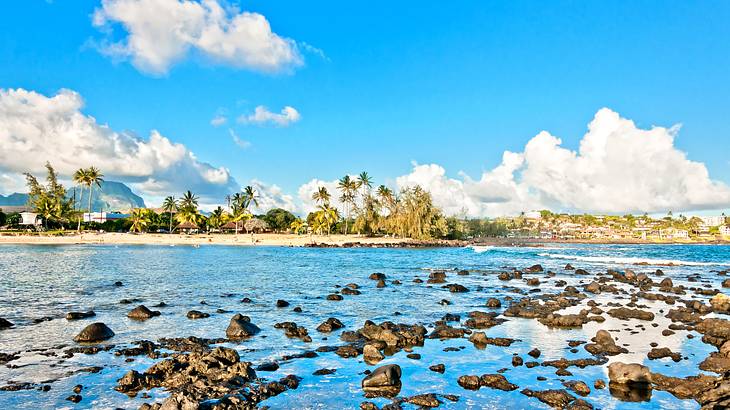 One of many things to do on Kauai with kids is spending a day at Poipu Beach Park