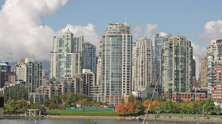 A waterfront with tall buildings, Vancouver, BC, Canada