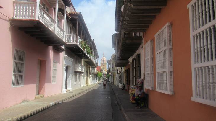 A colonial street with buildings each side in the Walled City