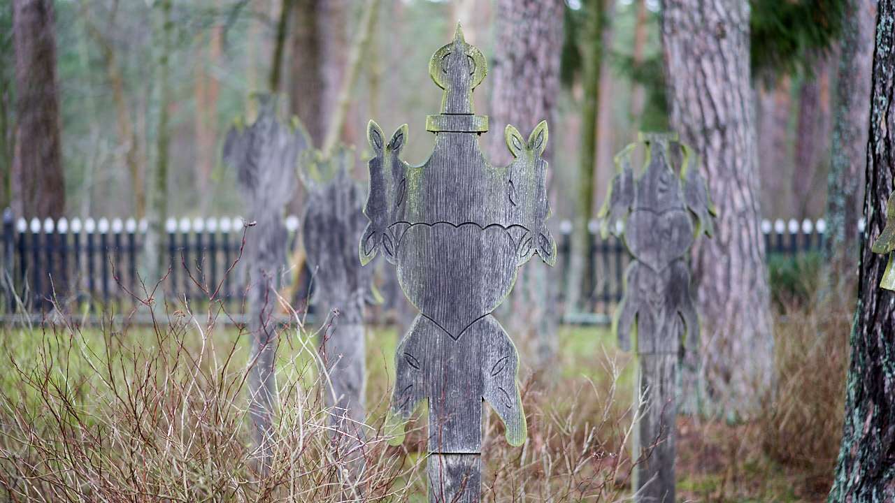 Wooden grave markers at Klaipeda Cemetery, Lithuania