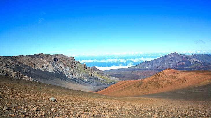 Volcanic mountainous landscape with blue sky above