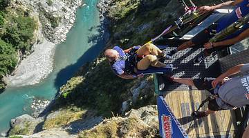 Man taking part in the Shotover Canyon Swing in Queenstown, NZ