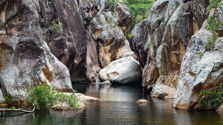 Amazing rock formations behind creek water