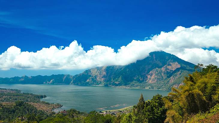 A mountainous landscape with a lake in the middle