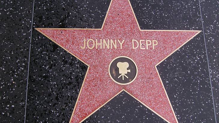 Looking down at a red star with Johnny Depp written in it