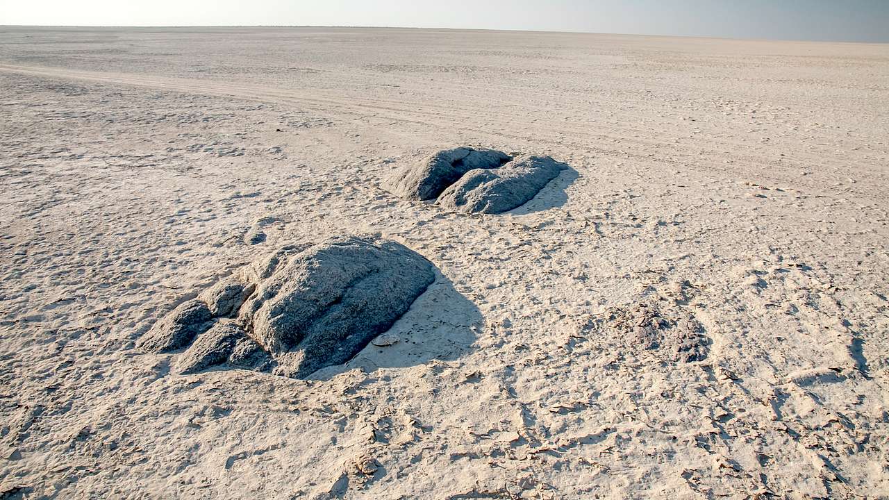 Salt flats under a clear sky in Botswana, Africa