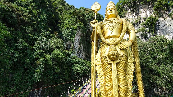 A gold statue at the Batu Caves, a must for a 3 day Kuala Lumpur itinerary