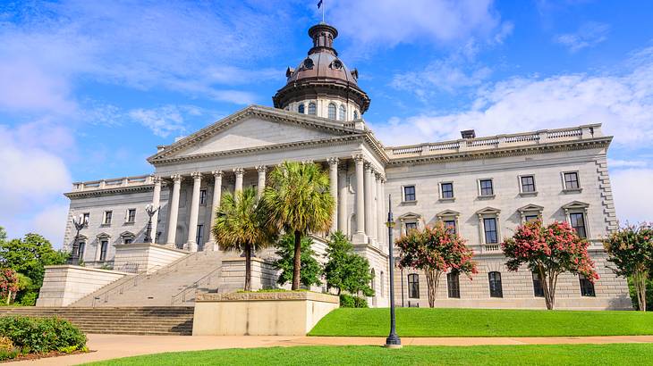 A neoclassical building with a copper dome and monolithic columns A neoclassical building with a copper dome and monolithic columns