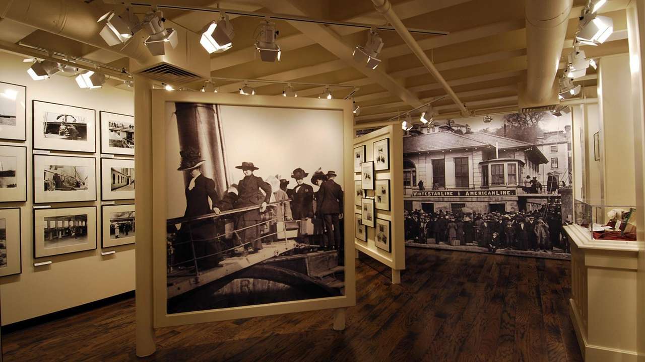 A museum exhibit with black and white photos