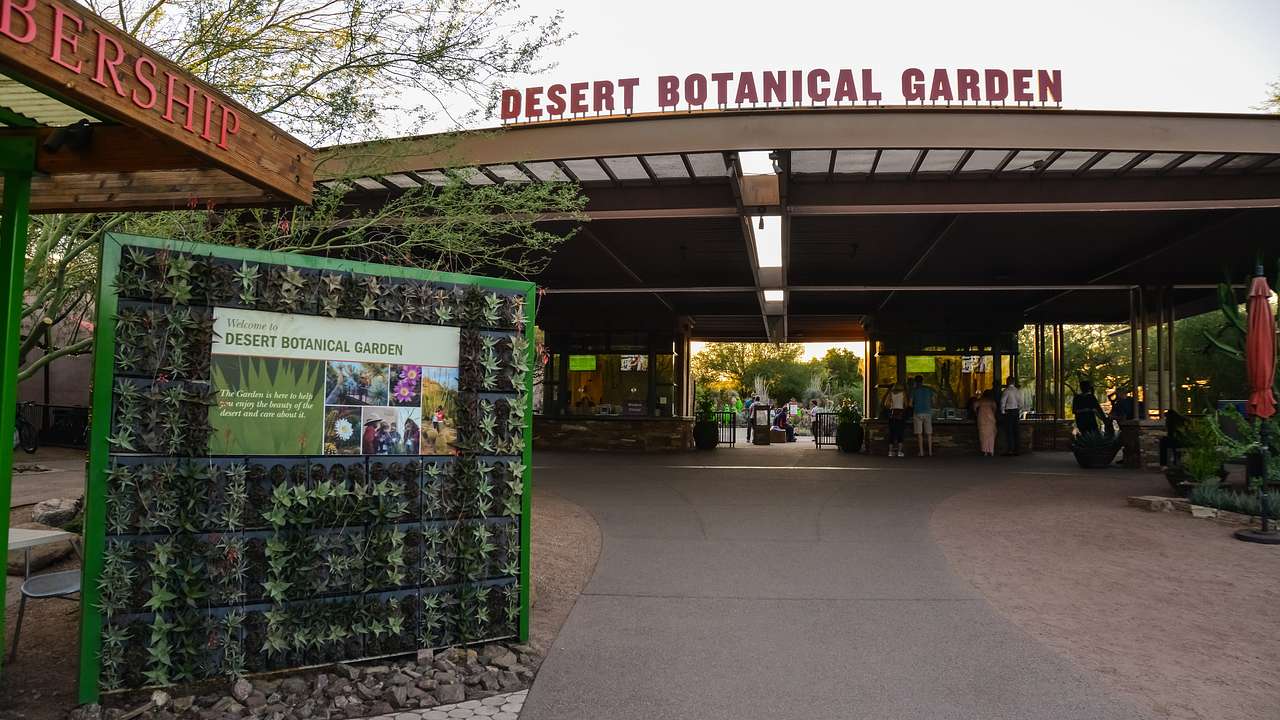 An entrance with the sign "Desert Botanical Garden"