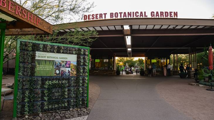 An entrance with the sign "Desert Botanical Garden"