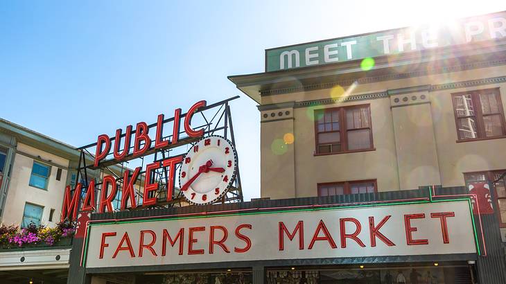 Signages on top of a building saying "Public Market" and "Farmers Market"