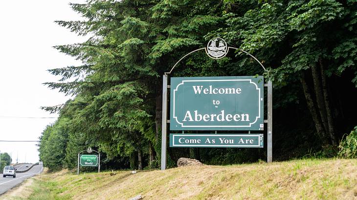 A road sign saying "Welcome to Aberdeen, Come As You Are"