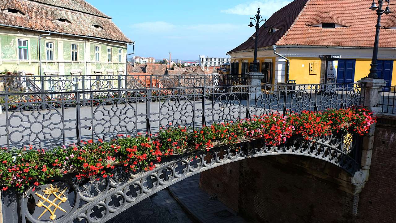 A bridge in front of a traditional house in a Sibiu, Romania